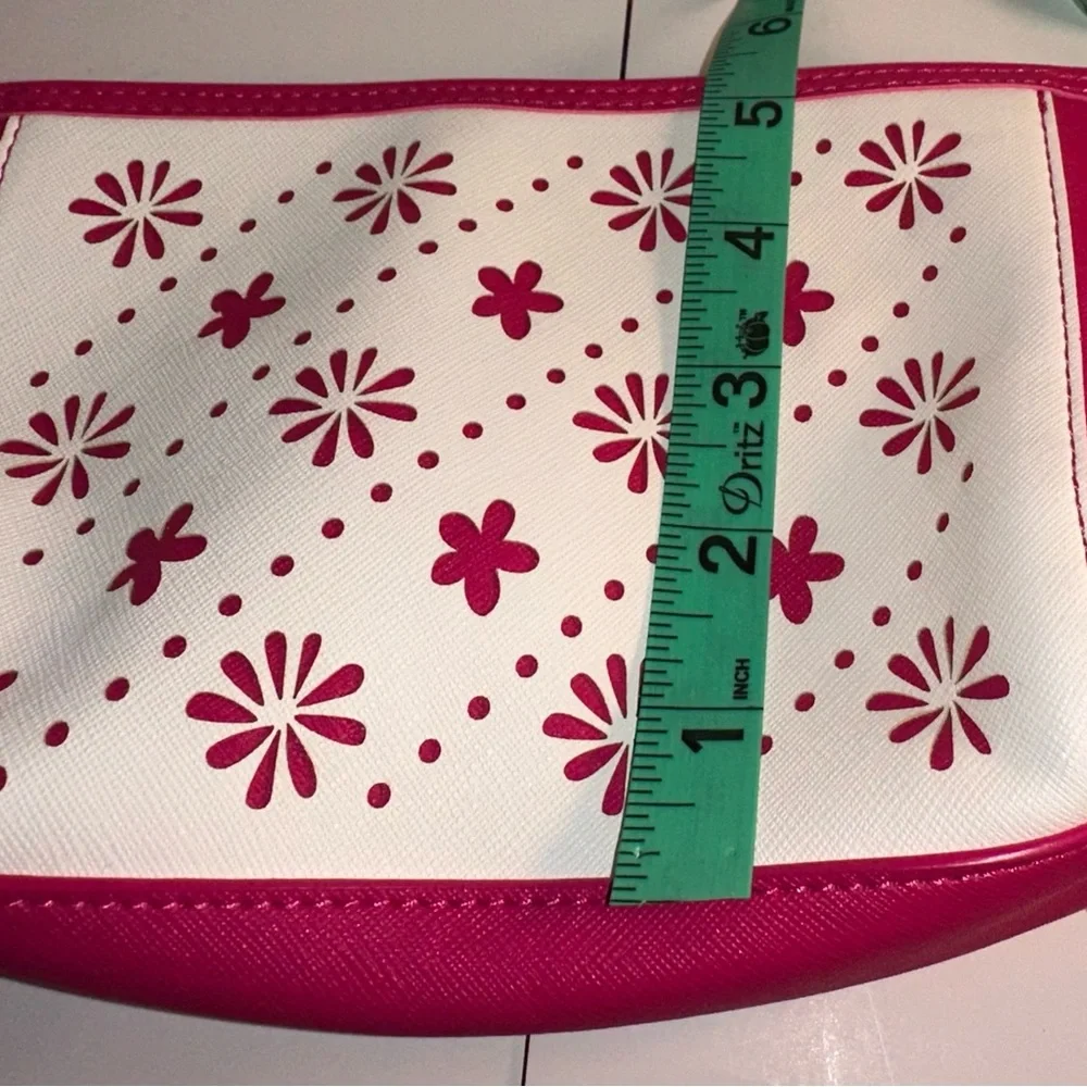 Vera Bradley Pink and White Laser Cut Floral Wristlet.